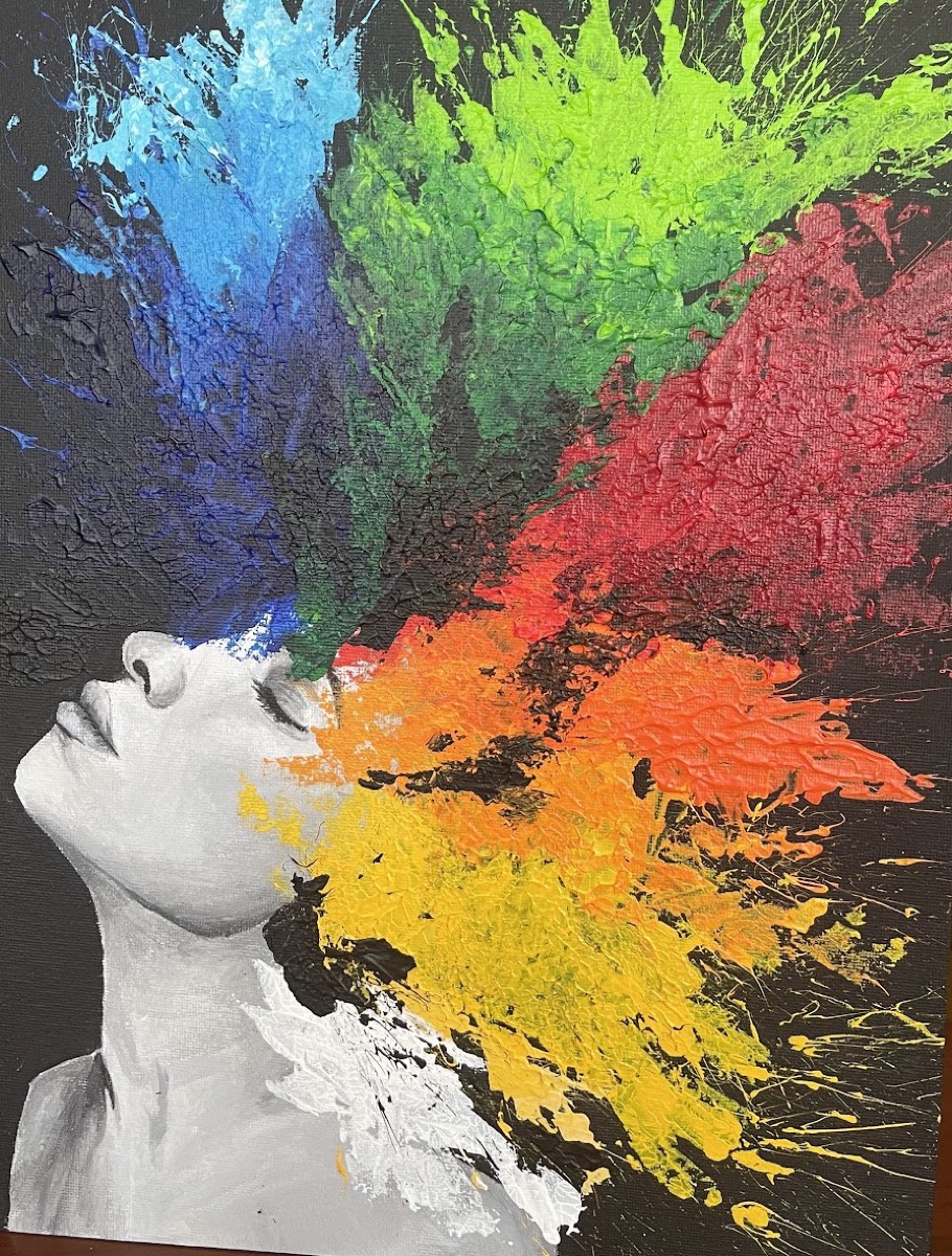 Cuadro pintado por una paciente: el perfil de una persona en blanco y negro con una explosión de pintura de colores que le sale de la cabeza